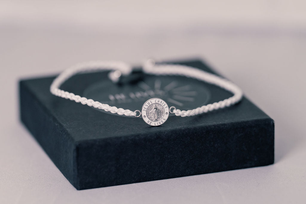 NEW* He Lives Bracelet- (11mm pendant)