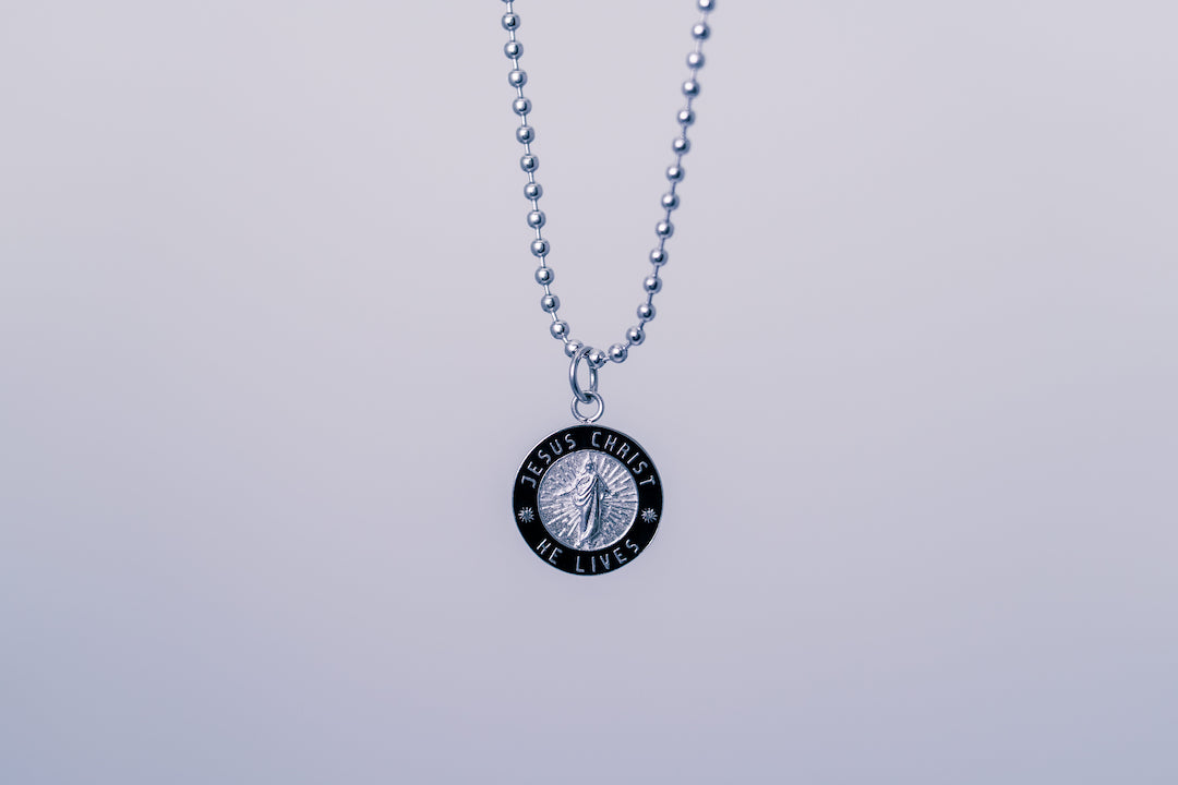 He Lives Necklaces