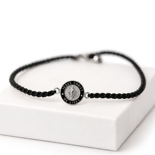 Black cord He Lives bracelet with 11mm silver pendant