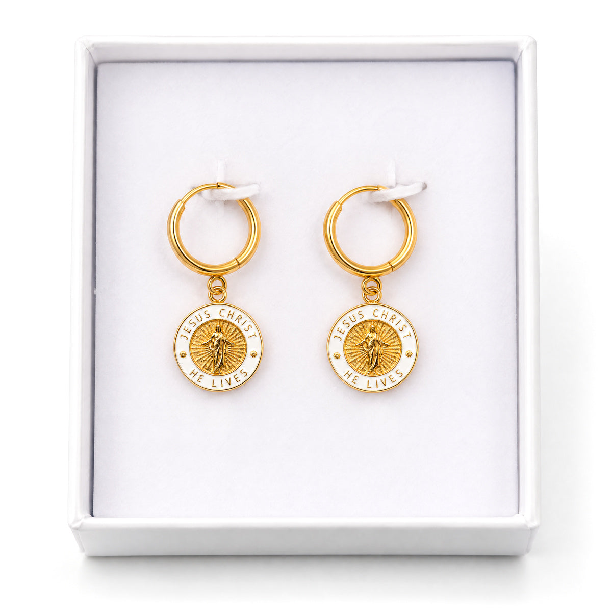 Gold and white He Lives earrings in gift box
