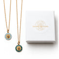 Light blue and teal He Lives small pendant necklaces with gift box