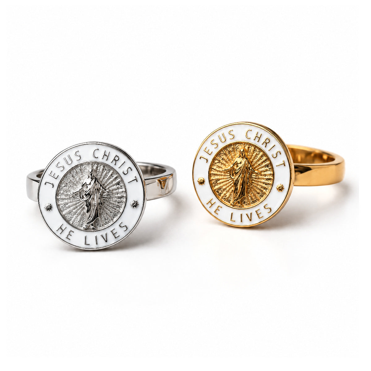 Silver and gold Jesus Christ He Lives rings side by side
